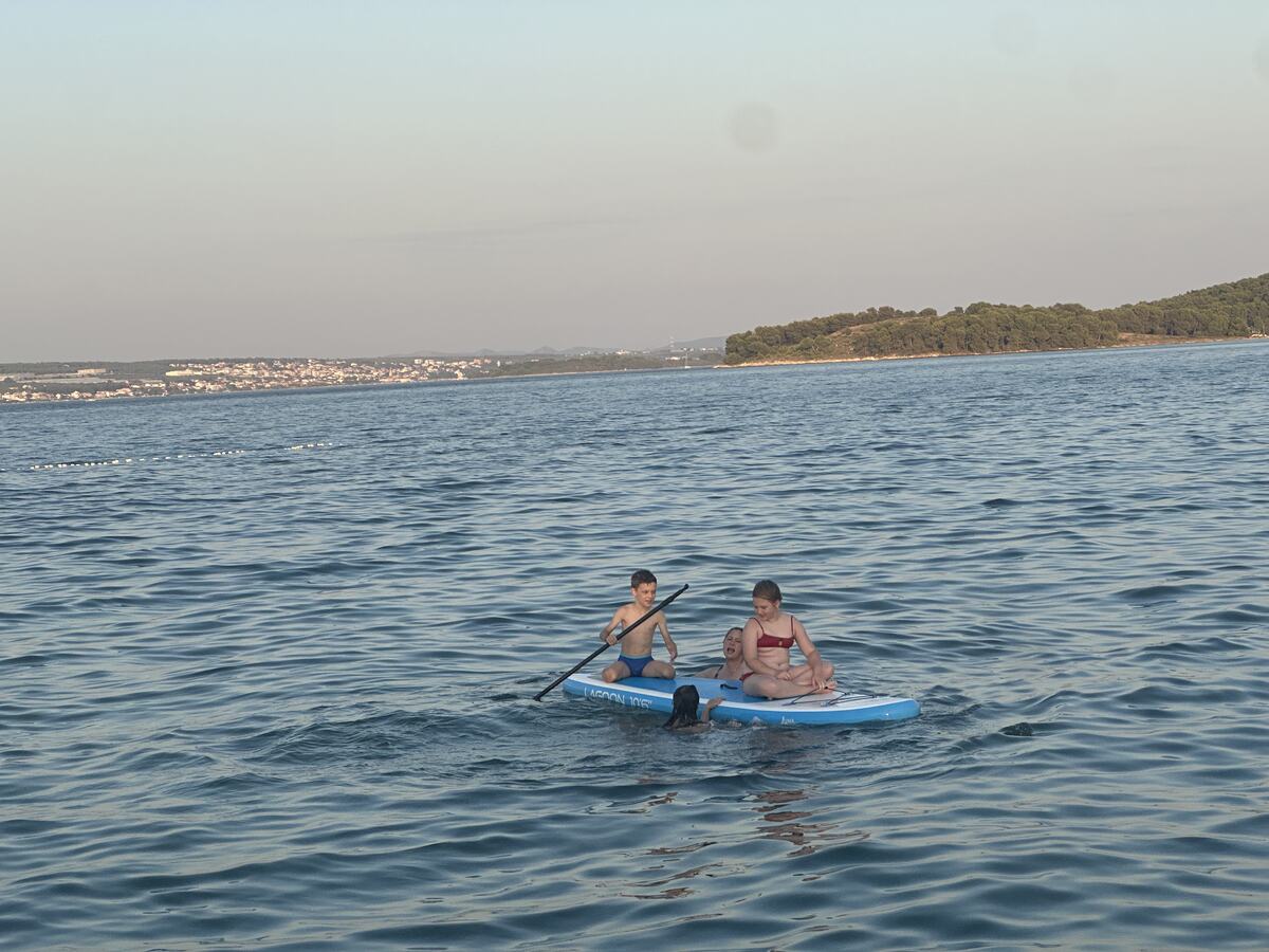 Paddleboarding in the bay near the house